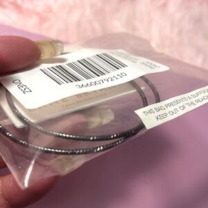 New in package, black hoop earrings